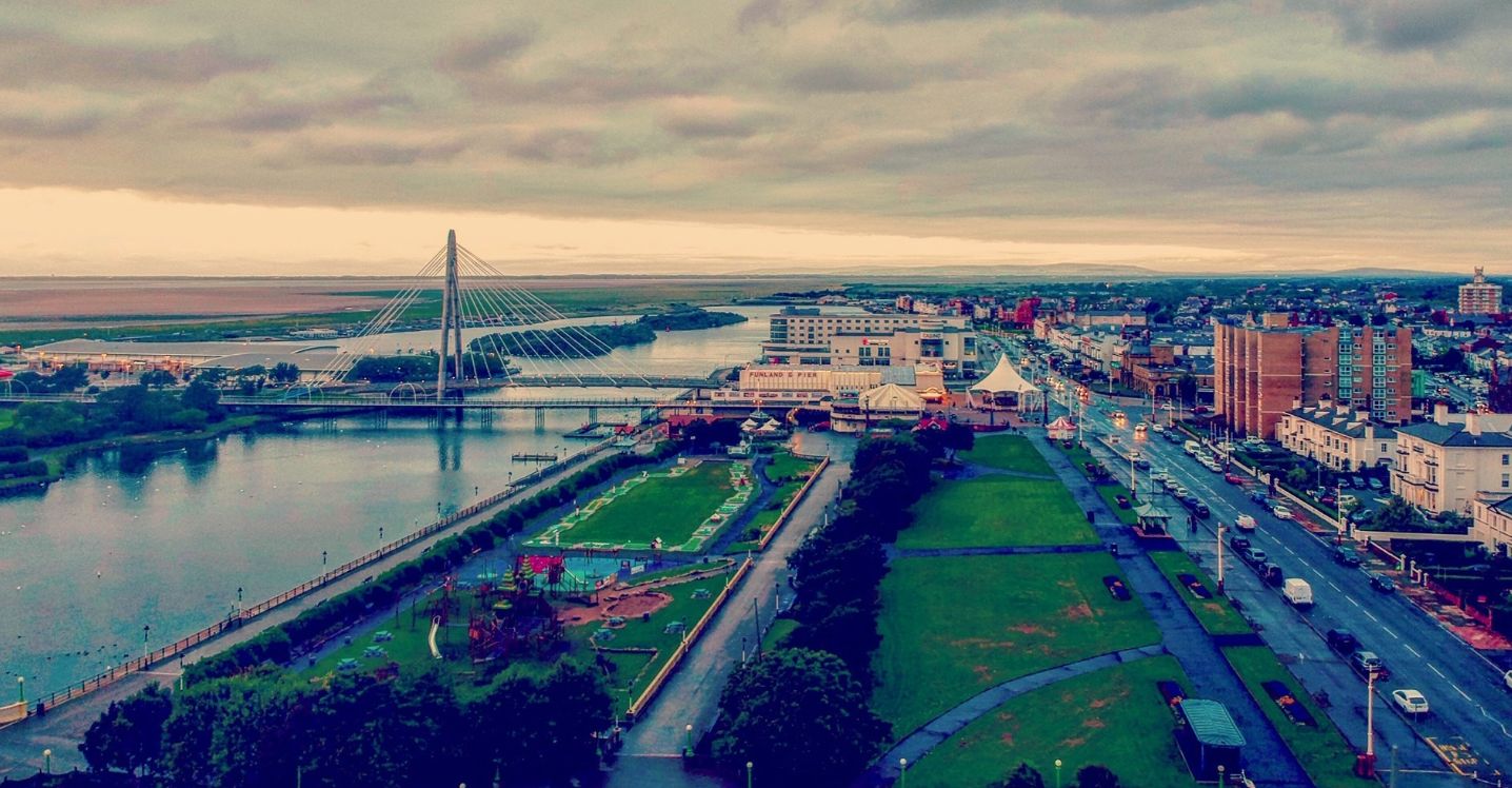 An aerial view of Southport, including the Marine Lake, King's Gardens, the Marine Way Bridge and Bliss Hotel.