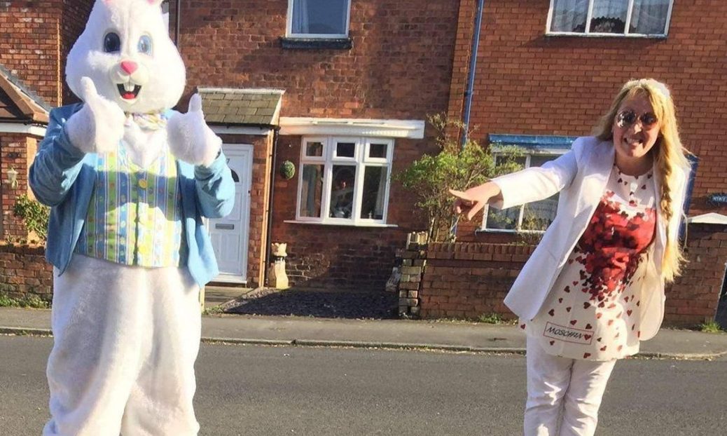 The Easter bunny and his friend Lili are waving to children in lockdown as they walk around roads in Southport