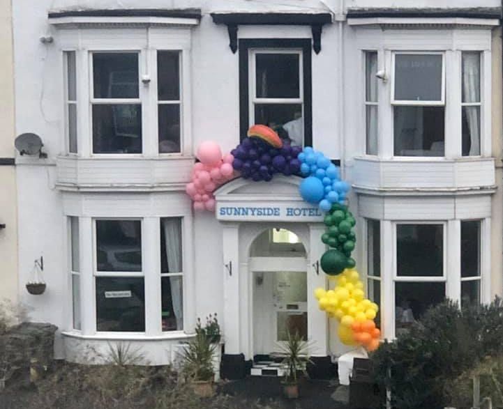 Rainbow balloons over the entrance at Sunnyside Hotel in Southport. Photo by Laura Hastings