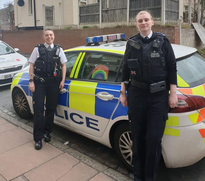 This police car in Southport is now adorned with rainbow pictures made by children at Norwood Primary School in Southport