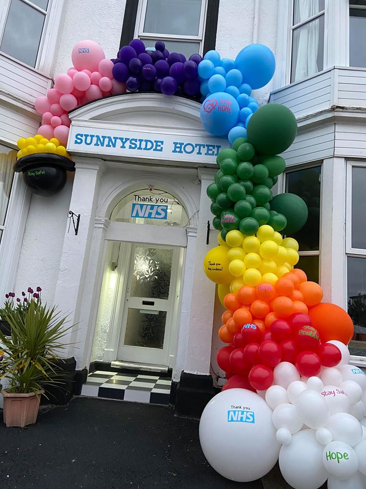 A rainbow balloon arch celebrating NHS workers has been created around the entrance of the Sunnyside Hotel in Southport. Photo by Anthony Duffey